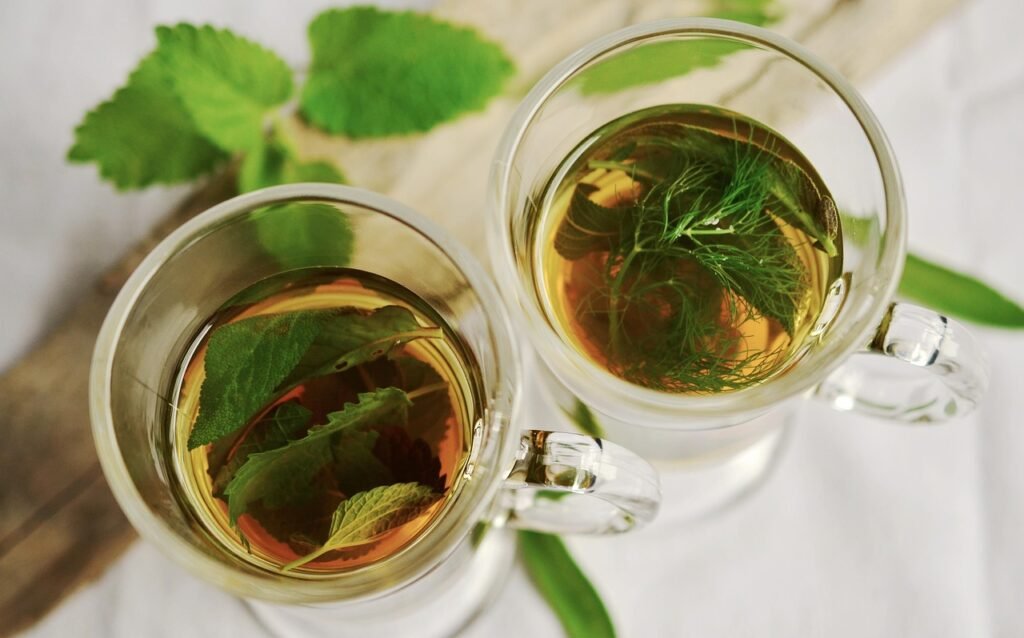 herbal tea, tea, herbs, cups, teacups, drinks, beverages, mint, sage, fennel flavor, nature, healthy, medicinal herbs, peppermint, leaves, tea herbs, herbal plant, glass for cold